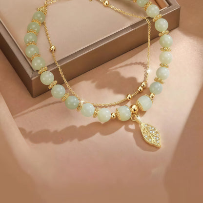 Women's Bracelet in Green Jade with Golden Details