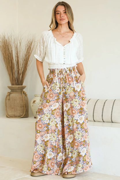 Ava | Eleganti Pantaloni a Gamba Larga con Stampa Floreale 7