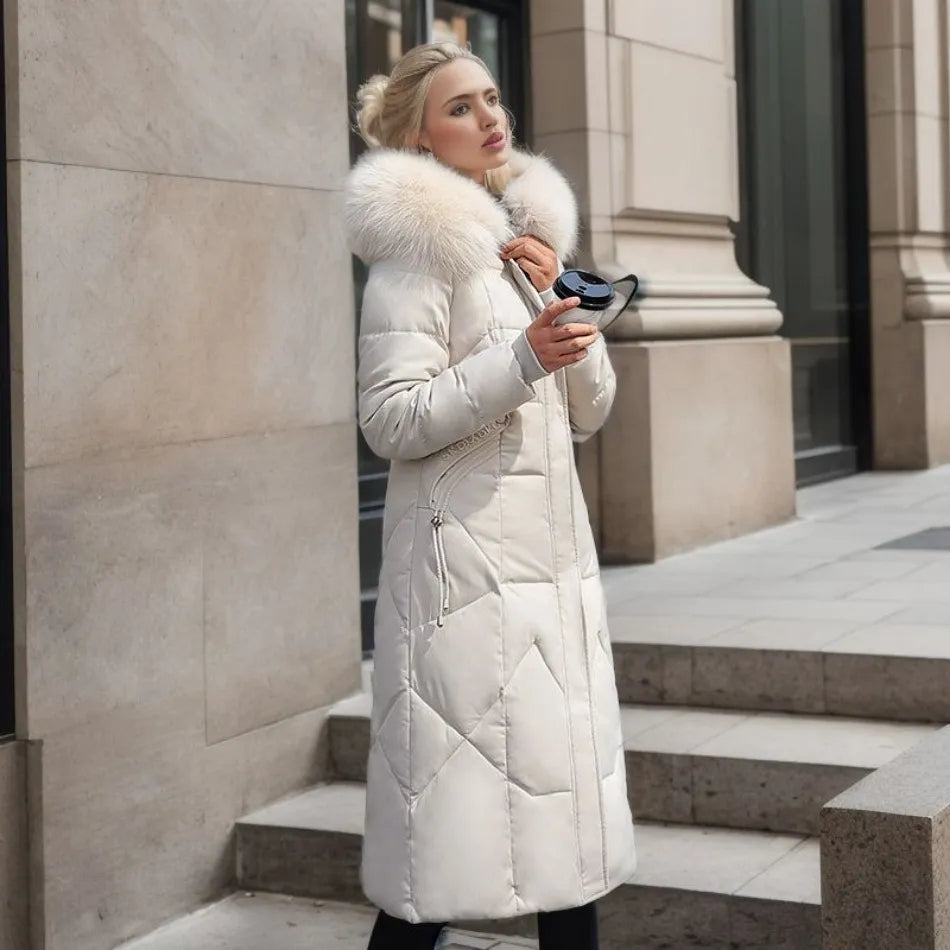 Gisella | Long women's quilted coat with large, trimmed hood - Winter elegance