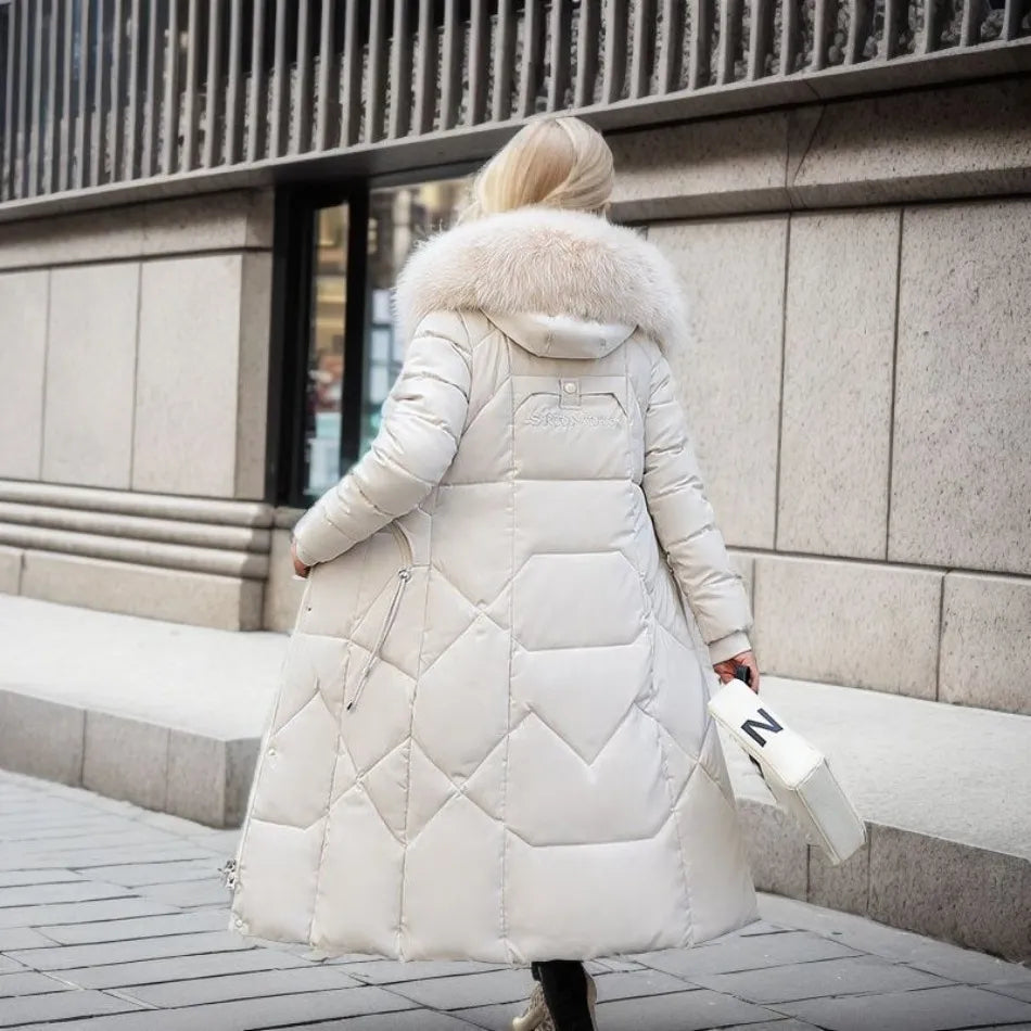 Gisella | Long women's quilted coat with large, trimmed hood - Winter elegance