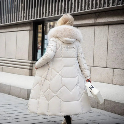 Gisella | Long women's quilted coat with large, trimmed hood - Winter elegance