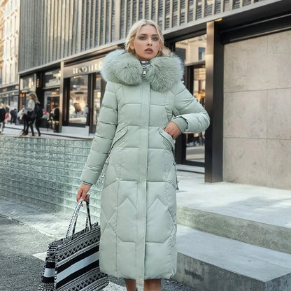 Gisella | Long women's quilted coat with large, trimmed hood - Winter elegance