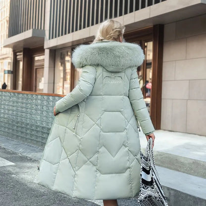 Gisella | Long women's quilted coat with large, trimmed hood - Winter elegance