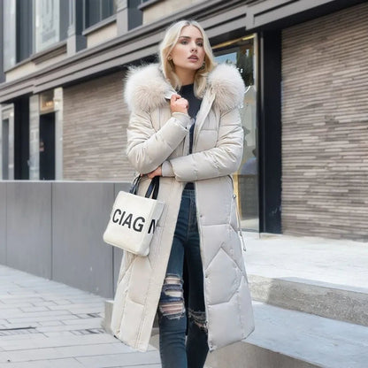 Gisella | Long women's quilted coat with large, trimmed hood - Winter elegance